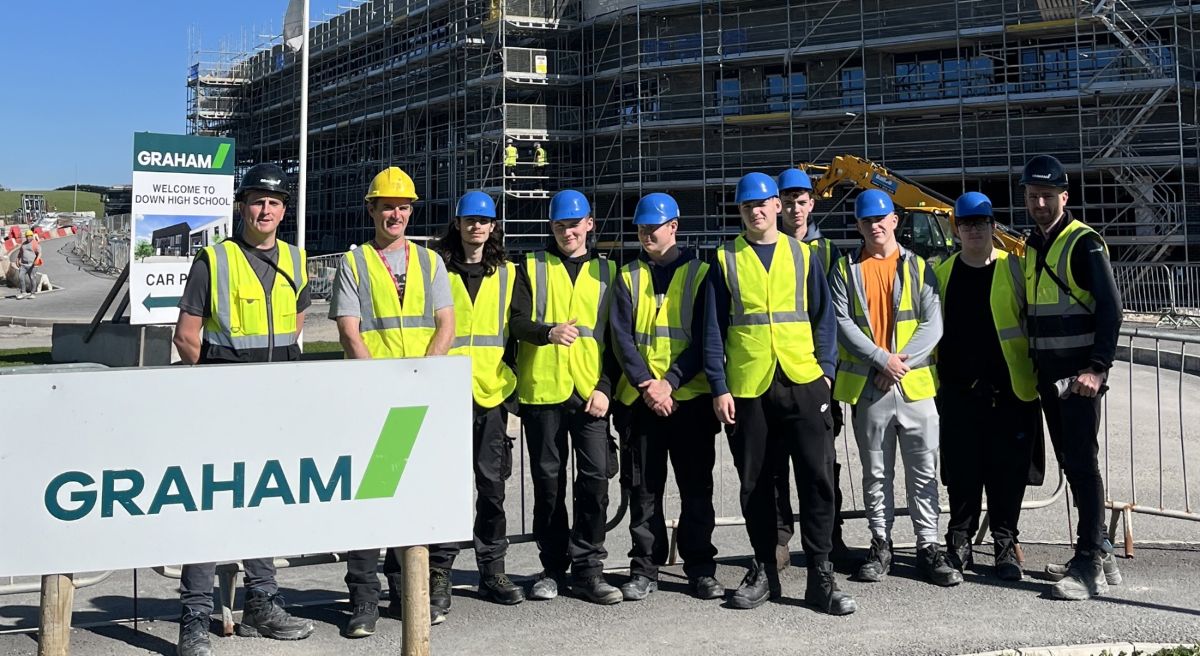 Construction students prepare for a tour of the new Down High School site